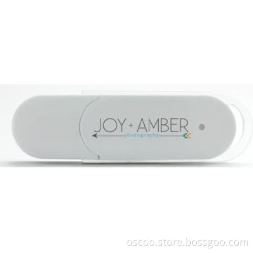 White slim usb with keyring attached